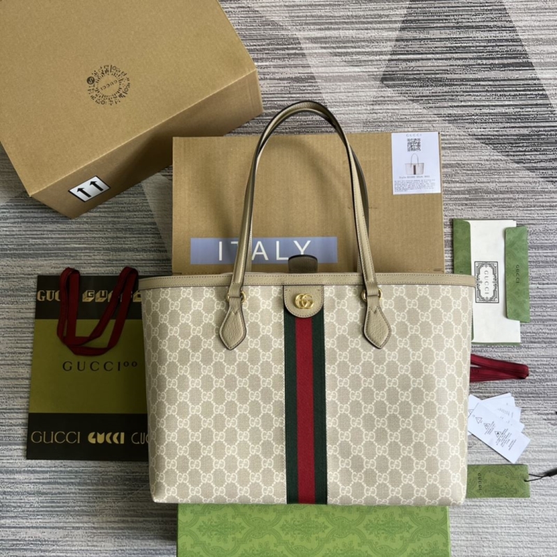 G*u*i shopping bags
